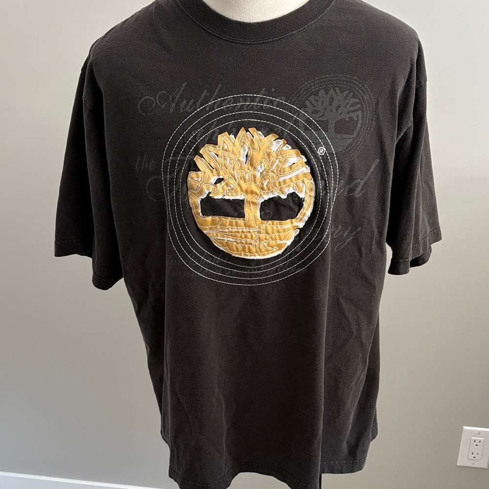 Timberland Men's Black Tee with Gold Emblem